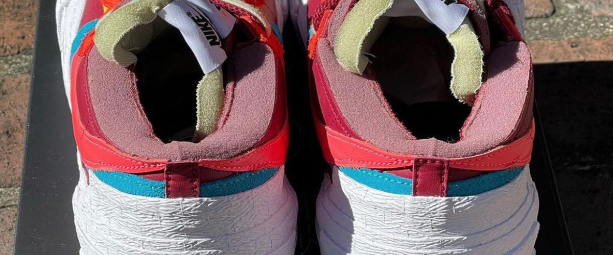 KAWS x sacai x Nike BlazerLow最新三方联名鞋款早已曝光多时，昨日更捎来全新紫色款式，而今番则是「TeamRed」配色率先..